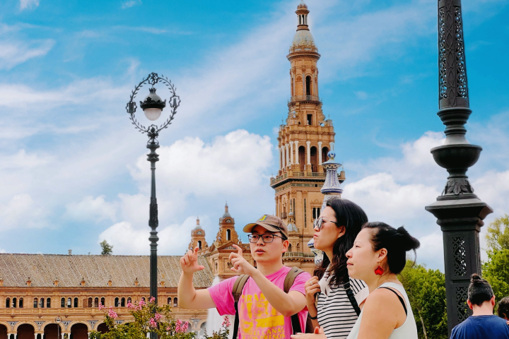 a group of people standing in front of a building