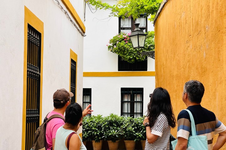 a group of people standing in front of a building
