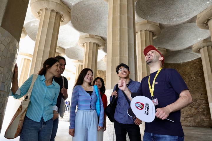 a group of people standing in front of a building