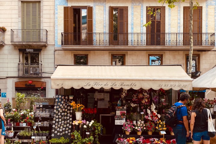 a group of people standing in front of a building