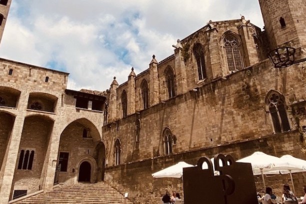 a large brick building with a clock tower