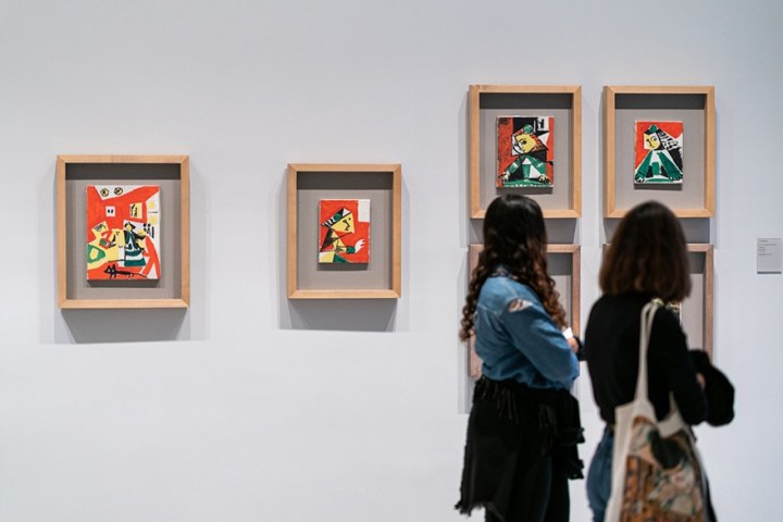 a group of people standing in a room