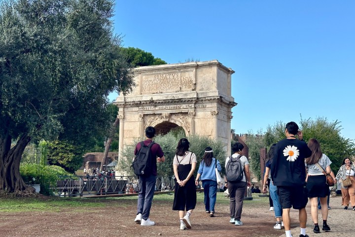a group of people standing in front of a building