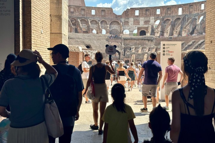 a group of people standing in front of a building