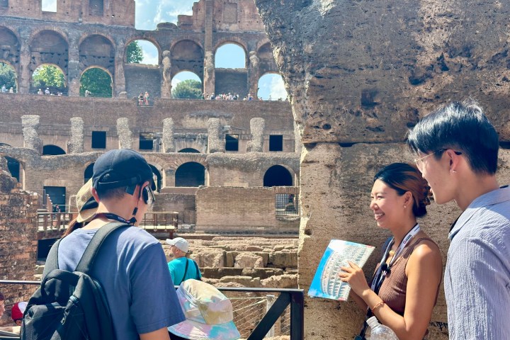 a group of people standing in front of a building