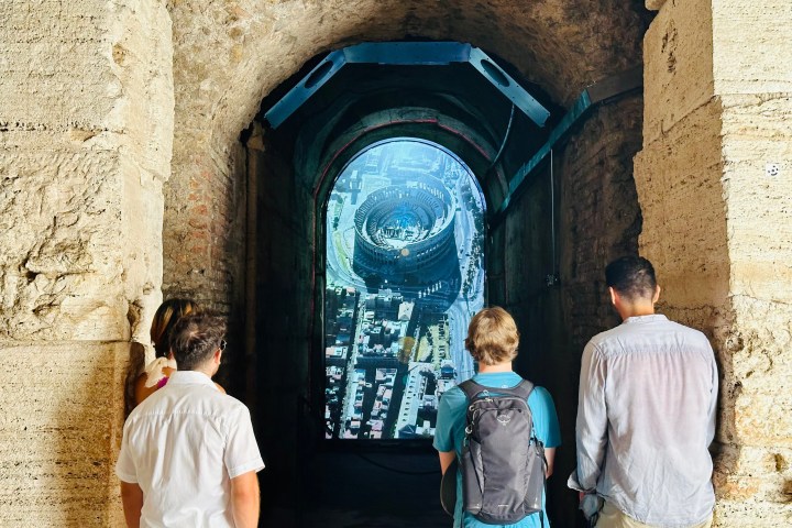 a group of people standing in front of a building
