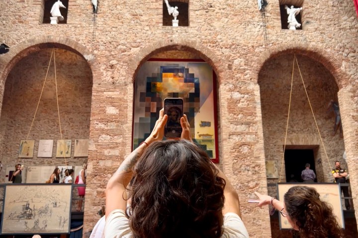 a group of people standing in front of a building