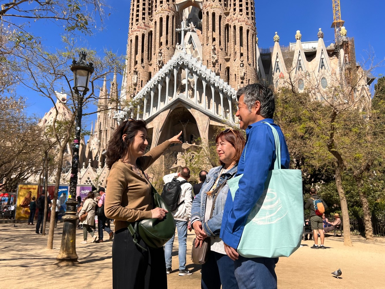 a group of people standing in front of a building
