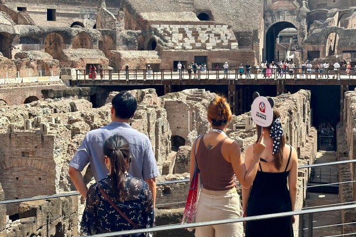 a group of people standing in front of a building