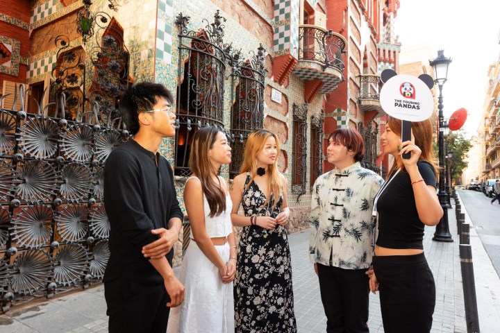 a couple of people that are standing in the street