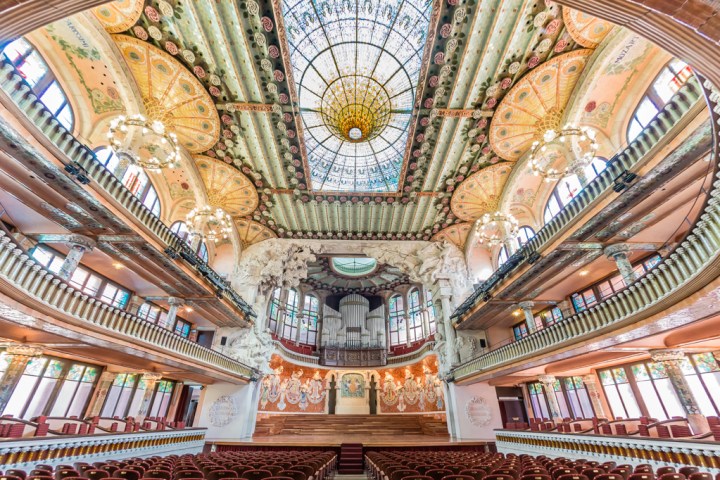view of the glass dome inside palau de la musica in barcelona