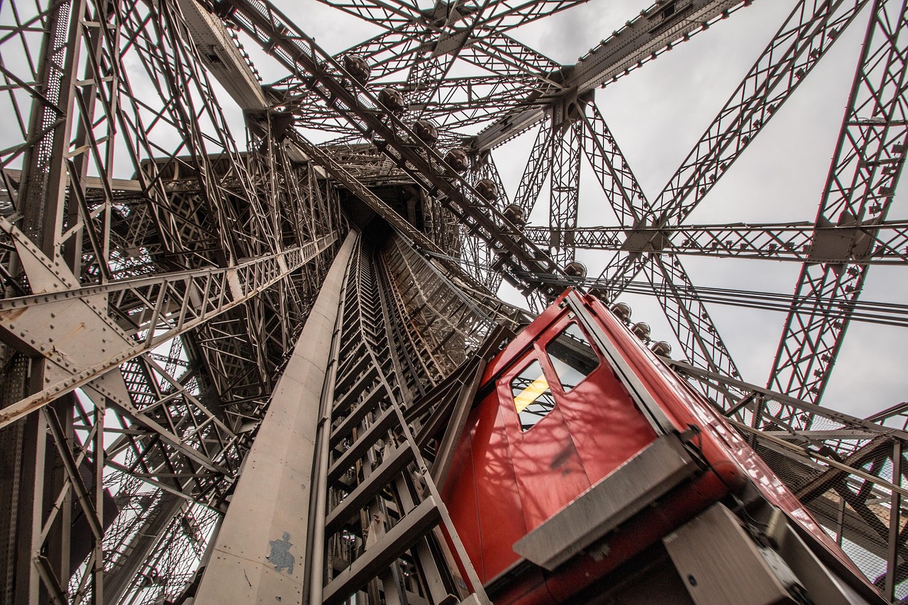 eiffel-tower-3530899_1280 detail of the elevator inside the eiffel tower