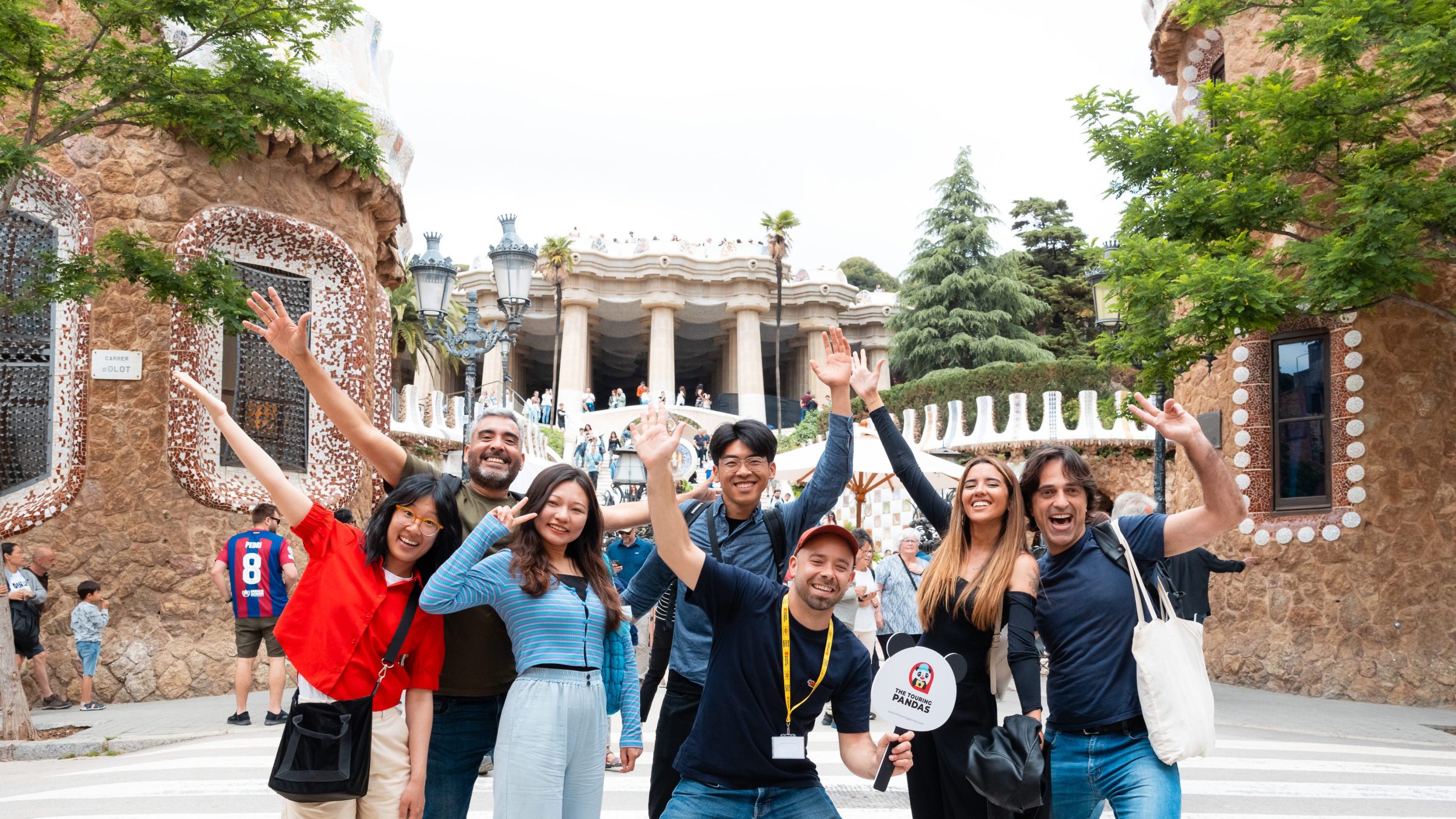 The Touring Pandas team at the entrance of Park Güell - About us section