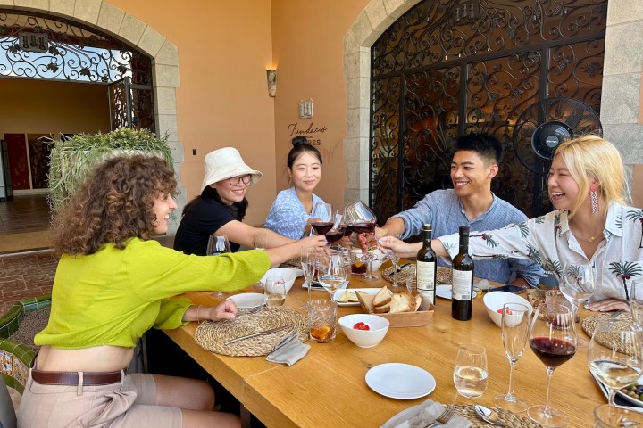 a group of people sitting at a lunch table