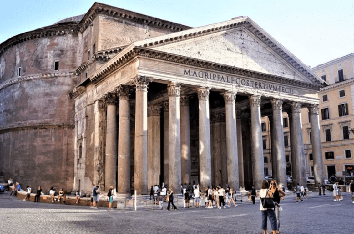 People outside the Pantheon in Rome, with its iconic columns and ancient architecture.